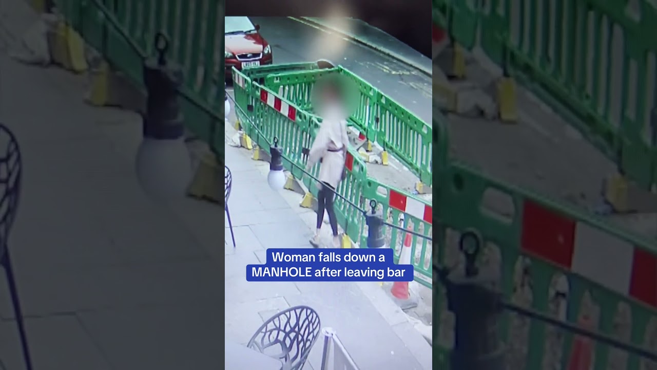 Woman falls down a MANHOLE after leaving bar