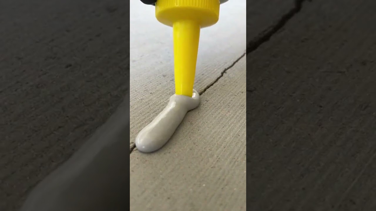 Documentary style 4K time lapse of a real garage floor restoration  Begin with oil stains  tire mark
