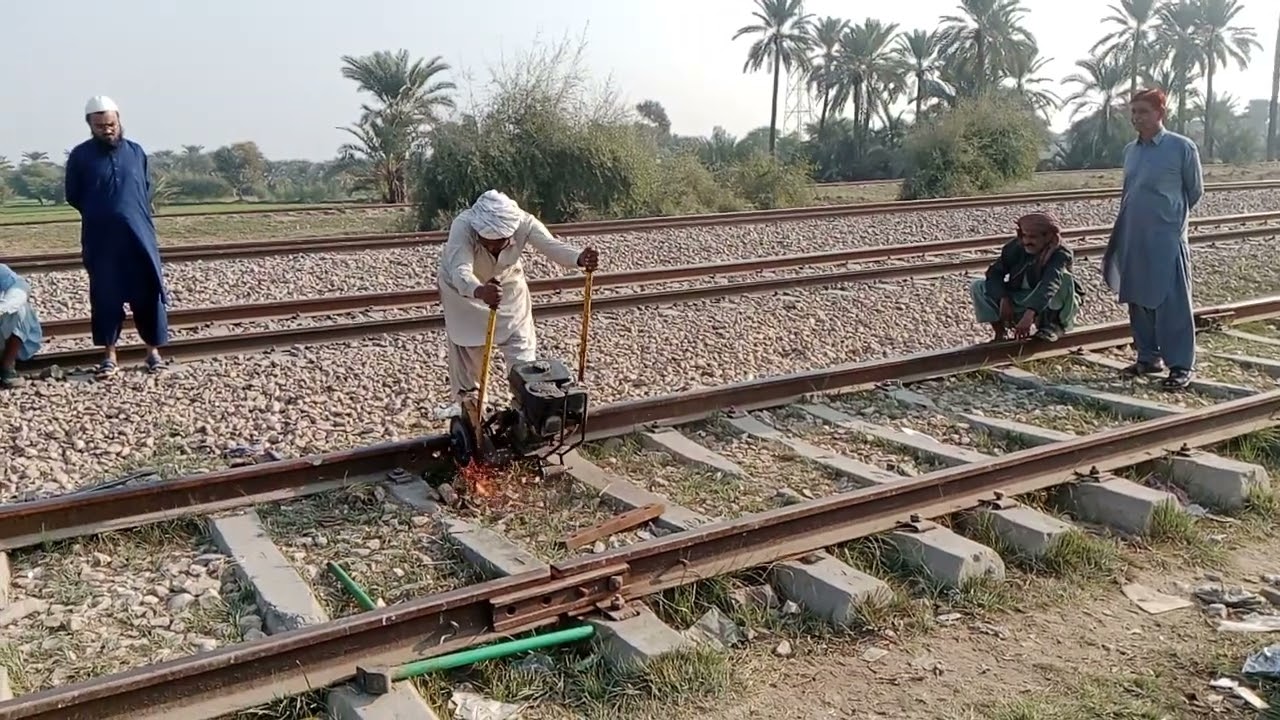 Engineering staff working on the railway track 