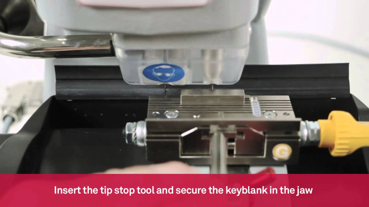 Key cutting machine for decoding and cutting of edge cut automotive keys | Keyline 994 Laser