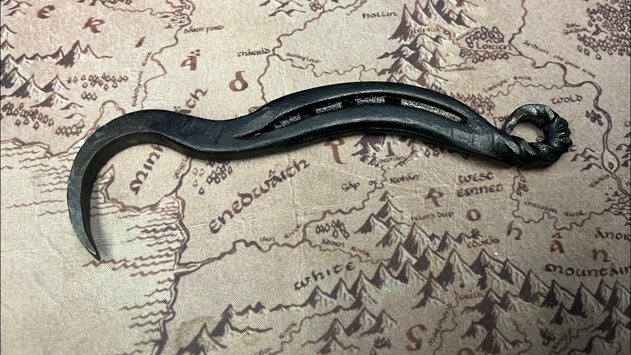 Hand forging a hoof pick from a horse shoe for Teikka Western Wear