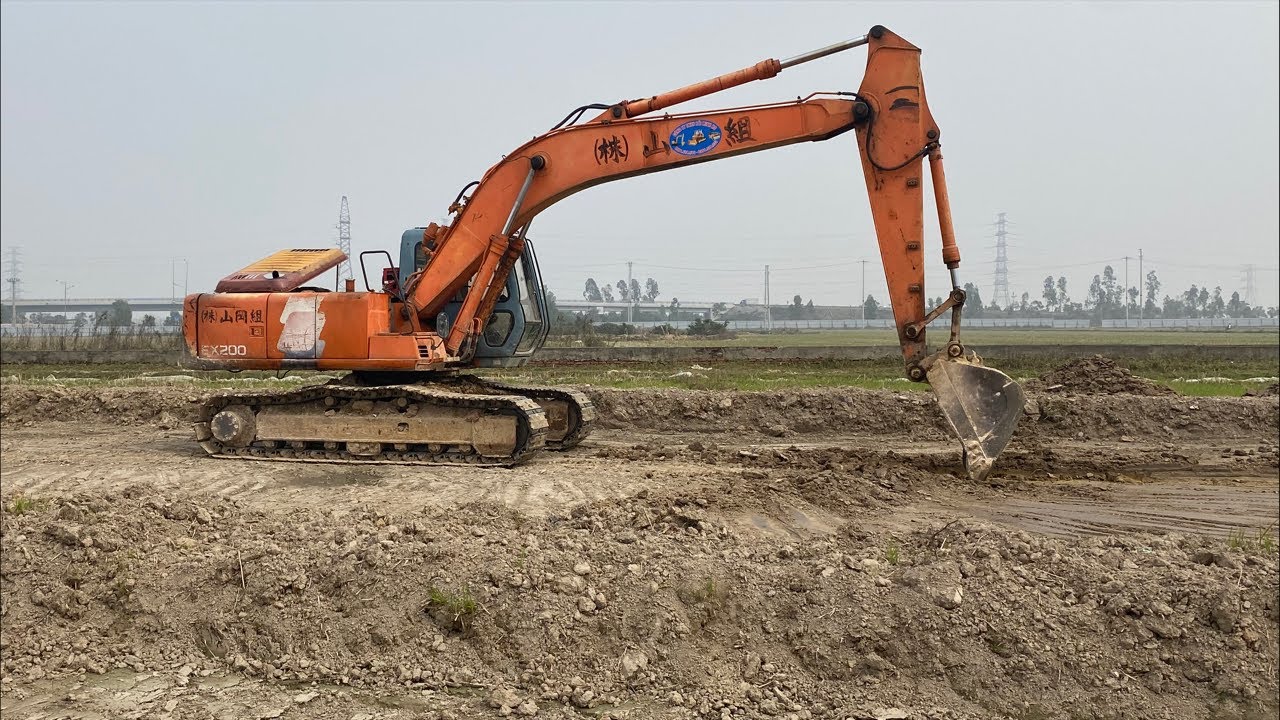 Máy xúc và oto howo