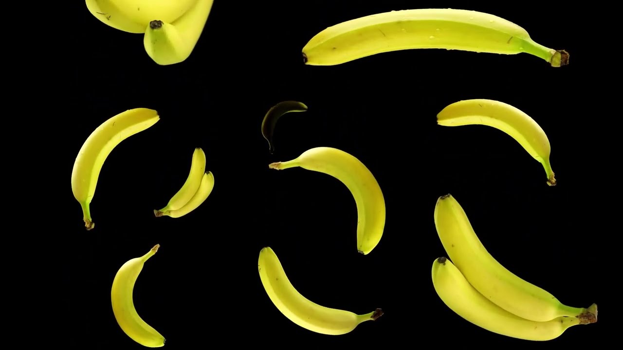1 Hour Background of falling bananas loop in slow motion