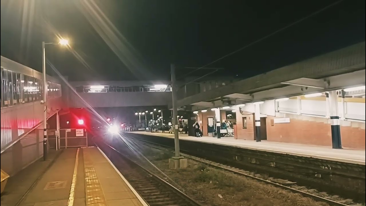 A Network Rail owned Harsco Technologies Multi Purpose Stoneblower heading through Peterborough 