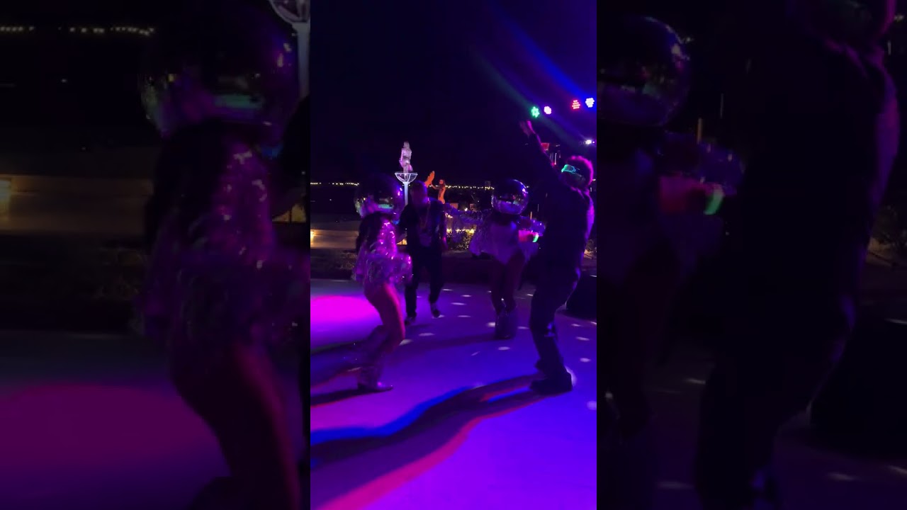 Disco Ball Head Dancers.