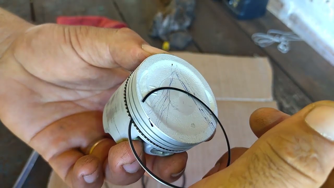 Como montar os anéis do pistão da pop 110i?