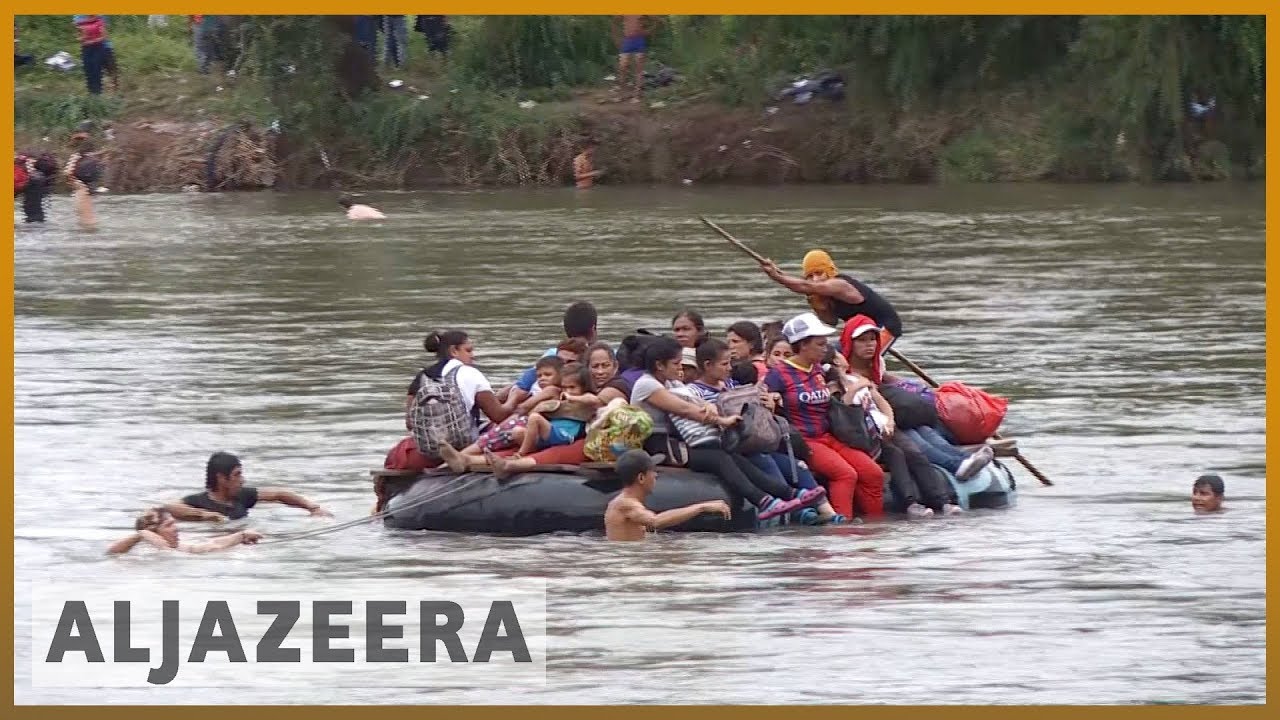 🇲🇽 Migrant caravan swims and rafts its way into Mexico | Al Jazeera English