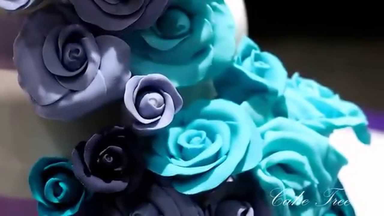 Wedding Cake - Cascading Roses in Shades of Purple and Aqua Blue.