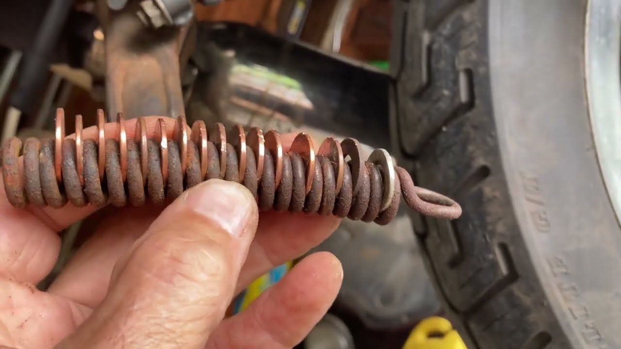 Center Stand Scraping, Spring Removal and Adjustment