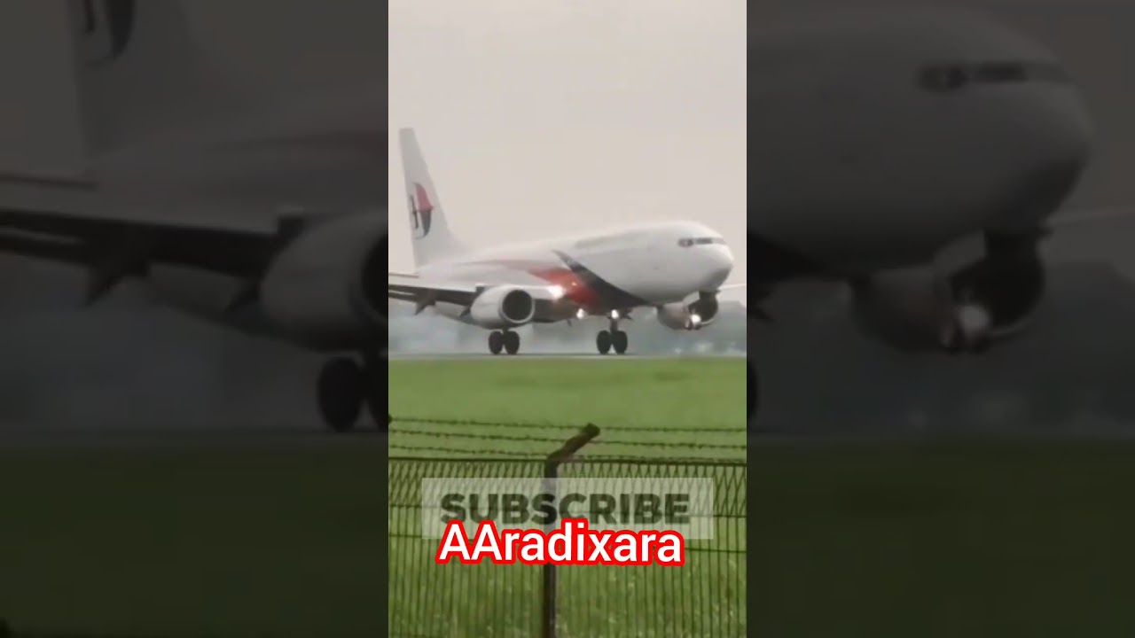 MALAYSIA AIR smoke coming out of the tires met the runway