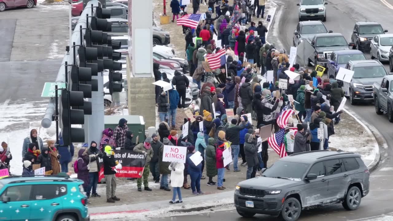 Protesters gather in Davenport, Iowa, to protest ICE