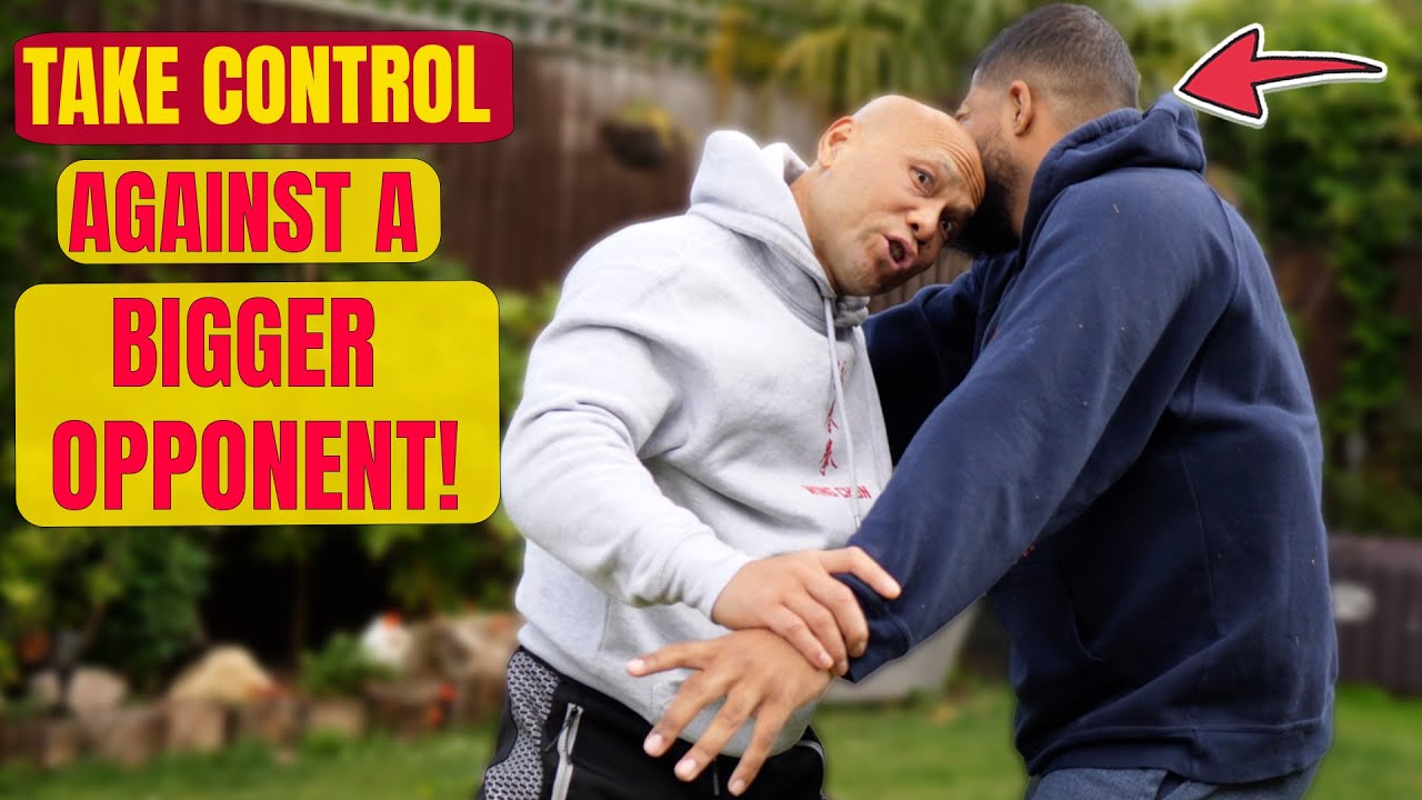 How do you defend against a bigger guy pushing you?