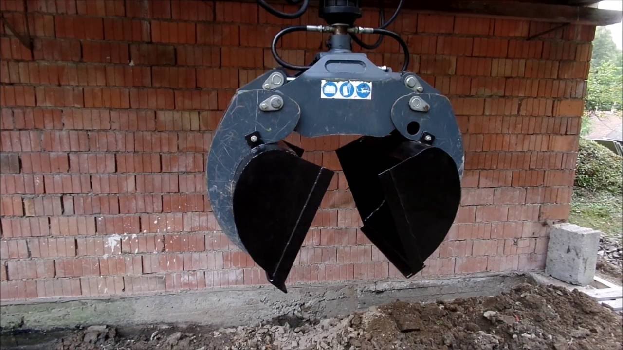 Vyvážečka UNHZ-500-1 (3) z lesního drapáku lžíce