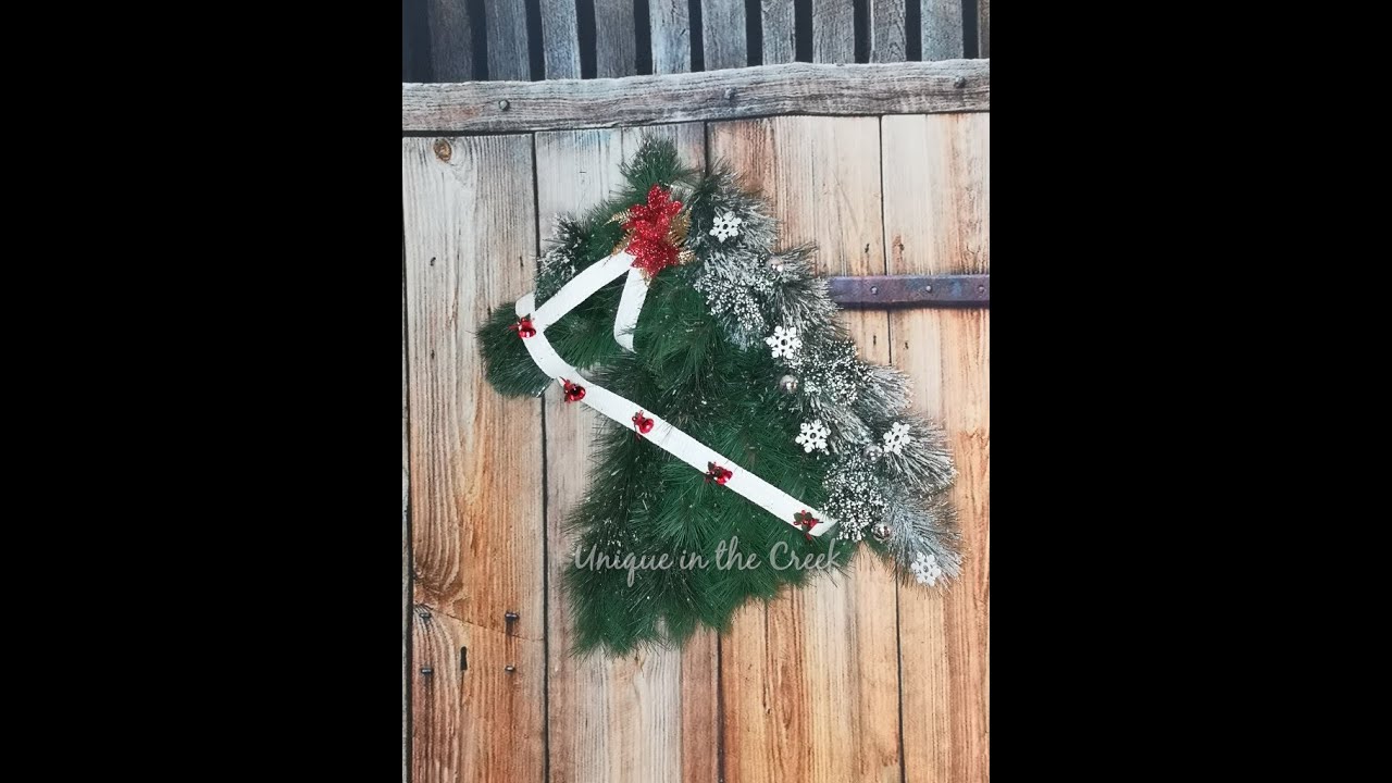 GREENERY PIECES FROM AN OLD CHRISTMAS TREE ON UITC HORSE BOARD