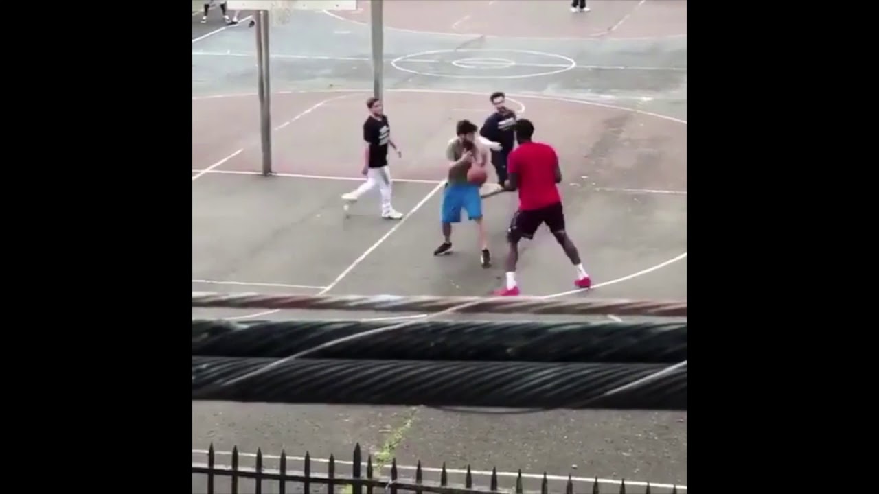 Joel Embiid bounces ball off guy's head and then windmills!