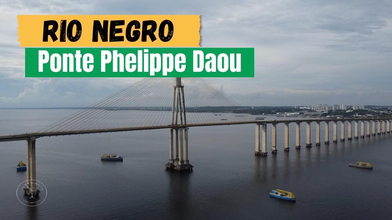 Rio Negro com as suas águas escuras e a maior ponte esteada do Brasil.