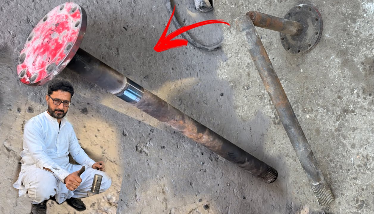 A broken axle is being repaired from the center. Made a broken axle look like new again