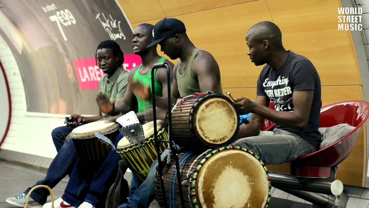 African Drummers playing Djembe drums in Paris Subway - How to play drums