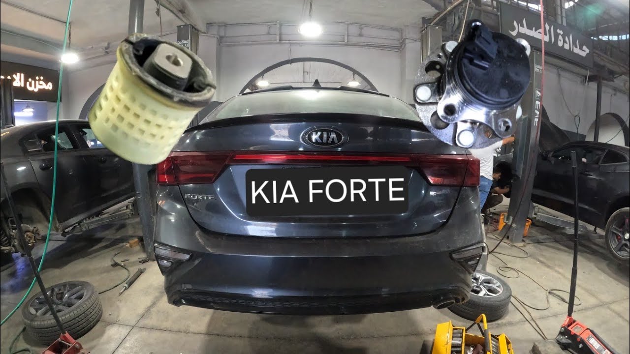 replacing rear axle beam bushing - rear wheel hub bearing - rear shock absorber ... kia forte