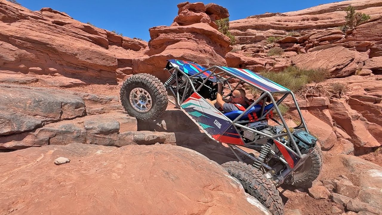 Randy in his Jimmy's 4x4 Buggy on Cliffhanger Z-Turn (Left Turn Obstacle) in Moab