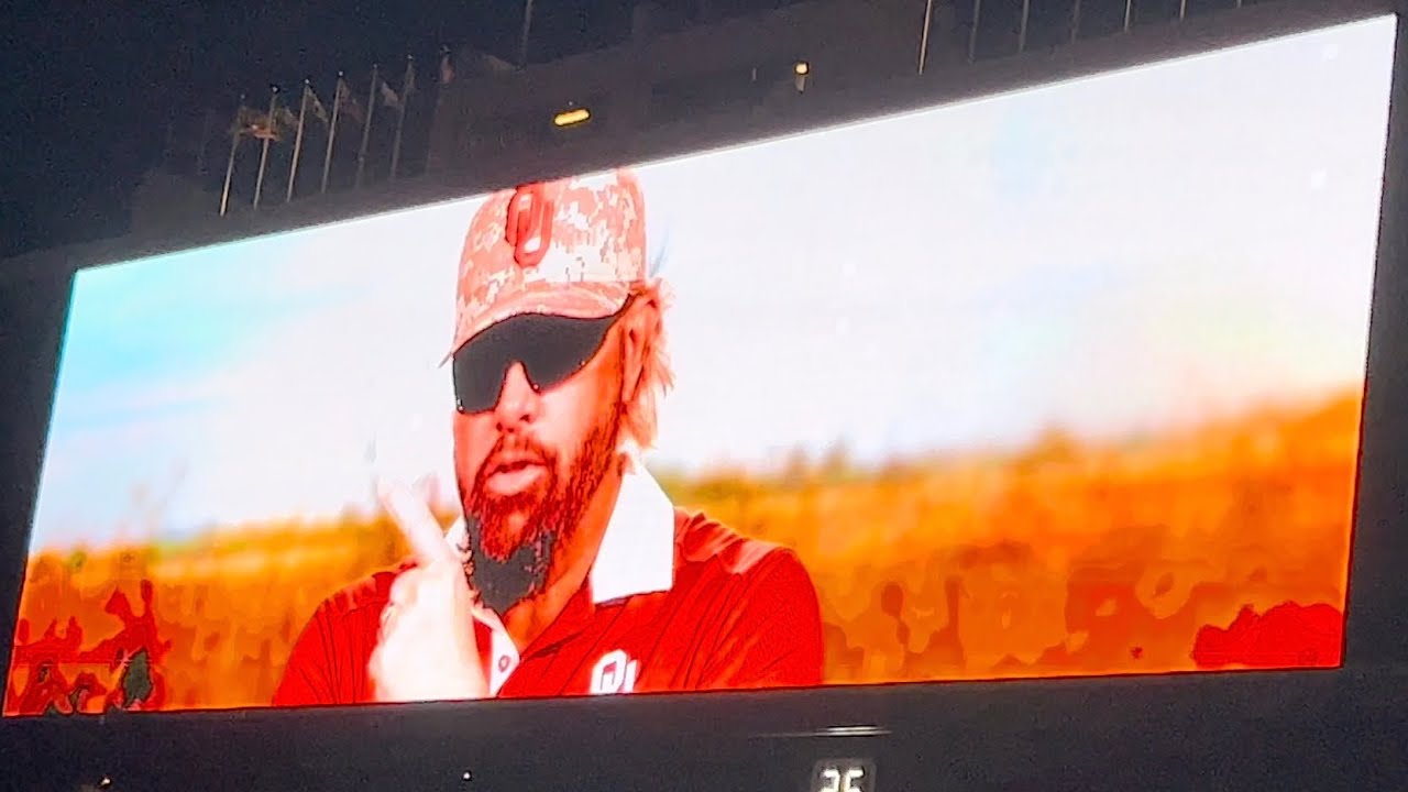 Toby Keith courtesy of the red, white and blue ,sing along at Oklahoma university football game