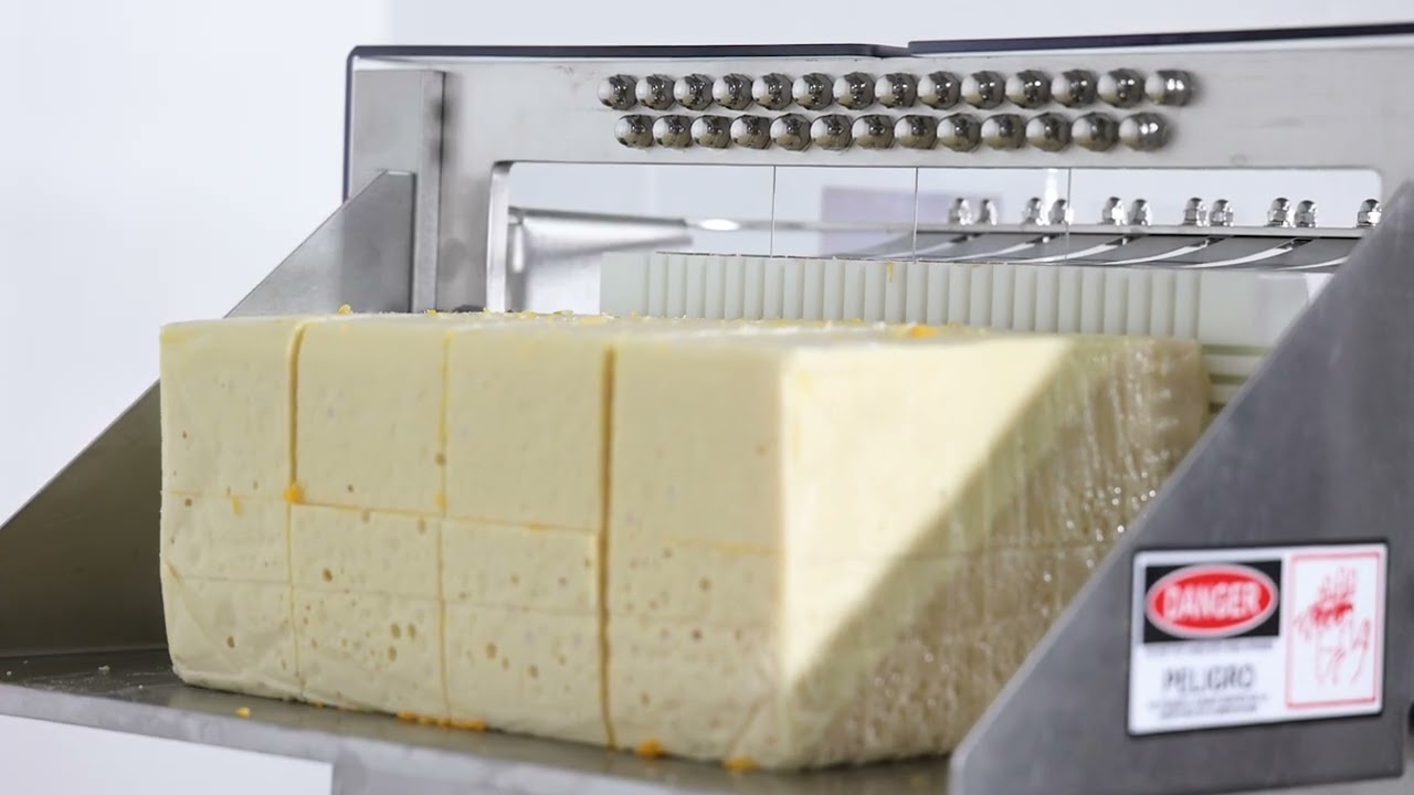 3005-LD Tu-Way Cutting Through a 40 lb Baby Swiss Cheese Block