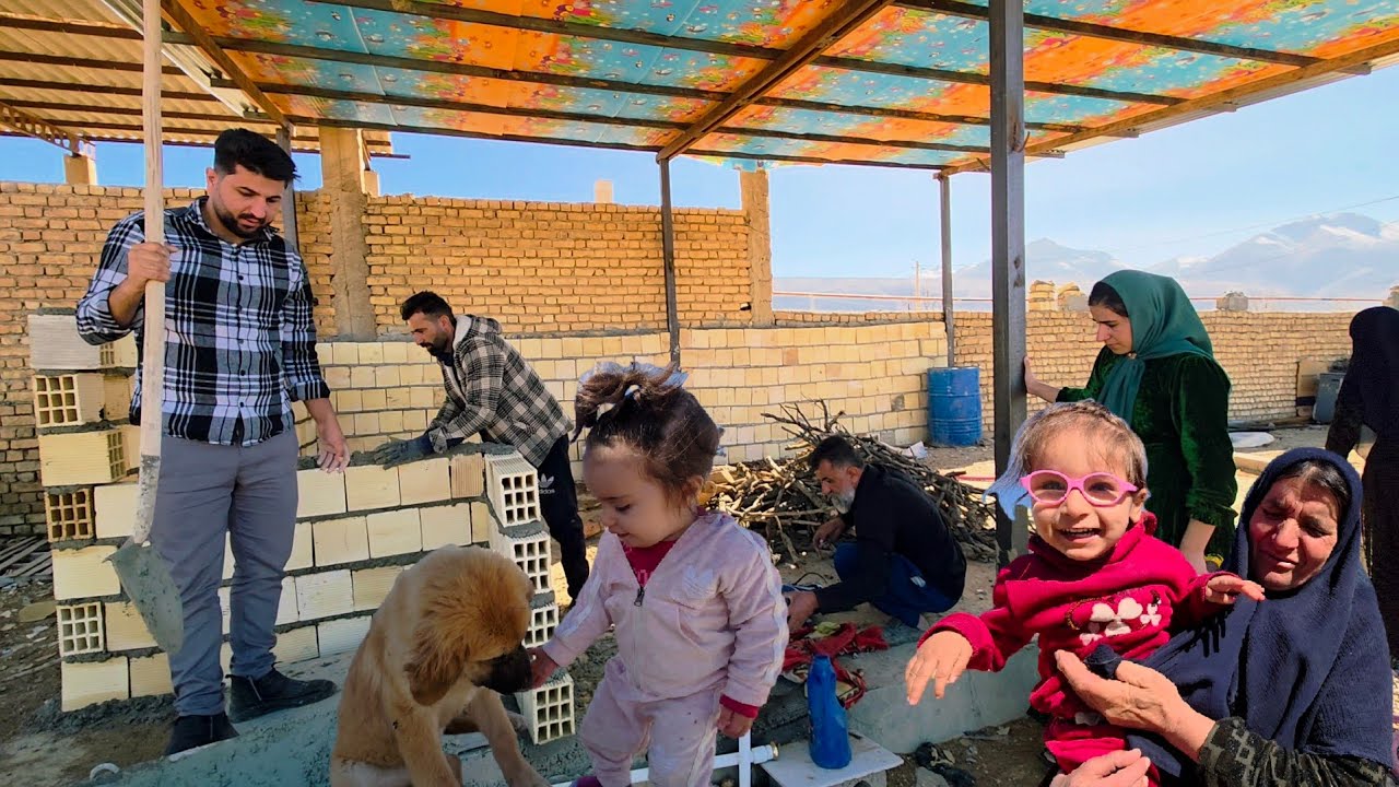 Rural family – Ava and Roz playing at the same time as the family works in the cowshed of Peren
