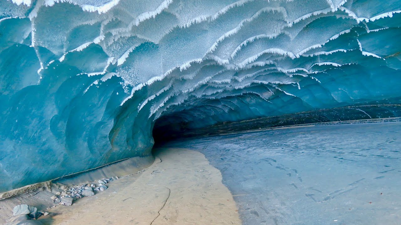 Hidden Ice Cave in Castner Glacier, Alaska. Arctic Hiking from Richardson Highway down Castner Creek