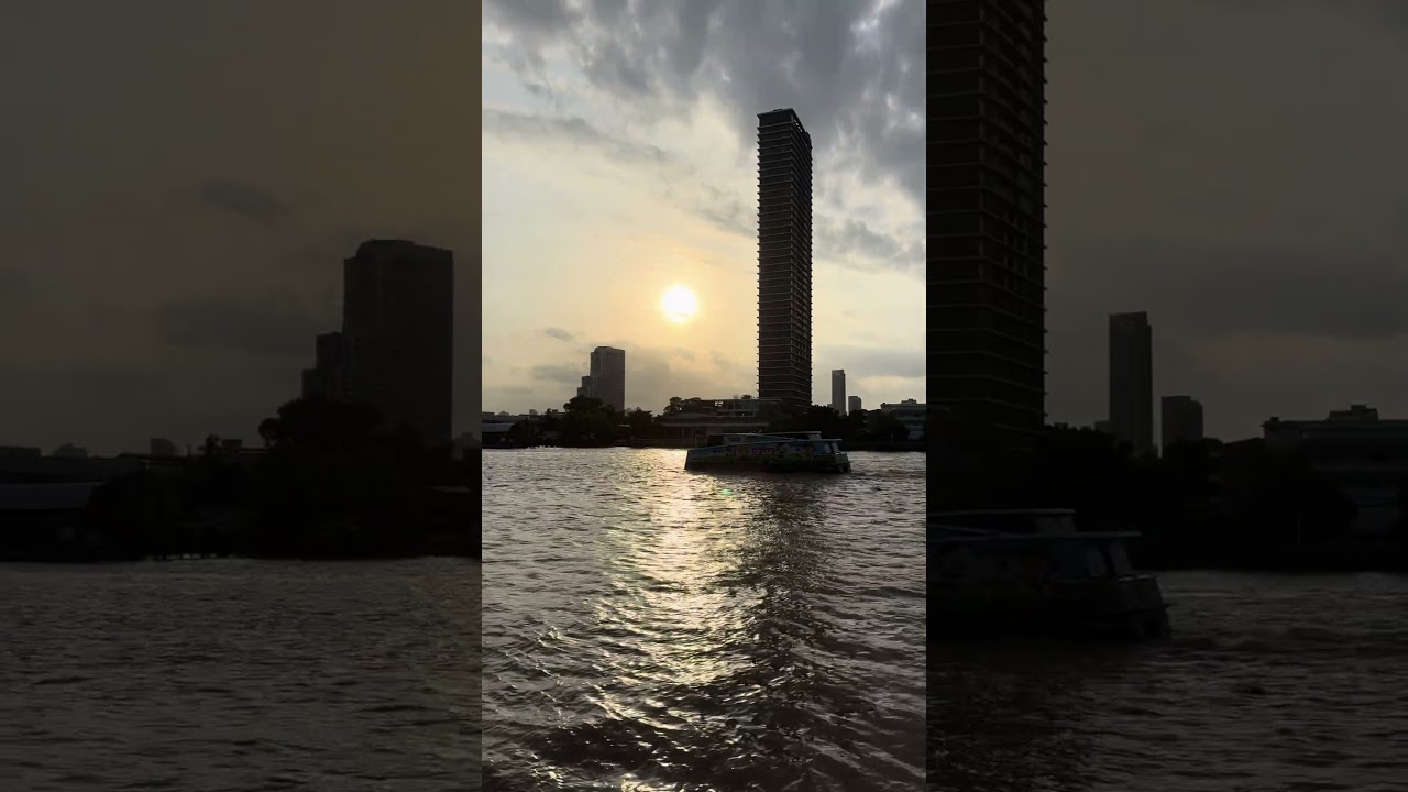 Sunset with Pop Mart boat on Chao Phraya River 
