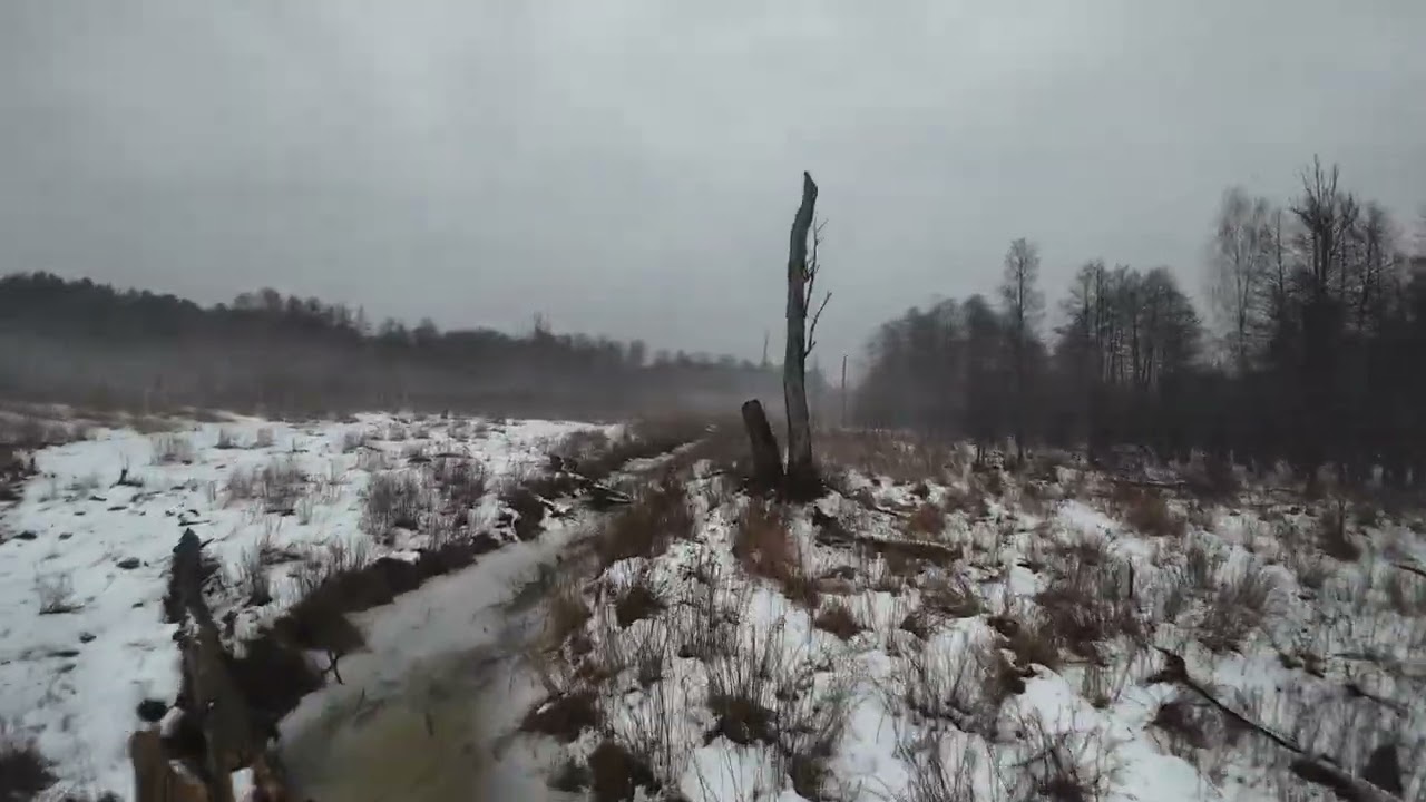 Winter foggy forest and icy river over the sky with small FPV crash 2