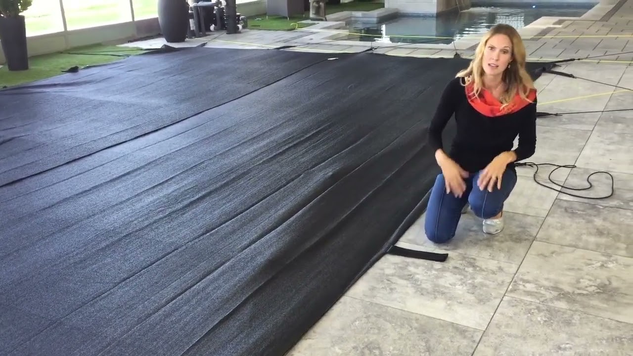 Installation d'une toile d’hiver pour piscine creusée