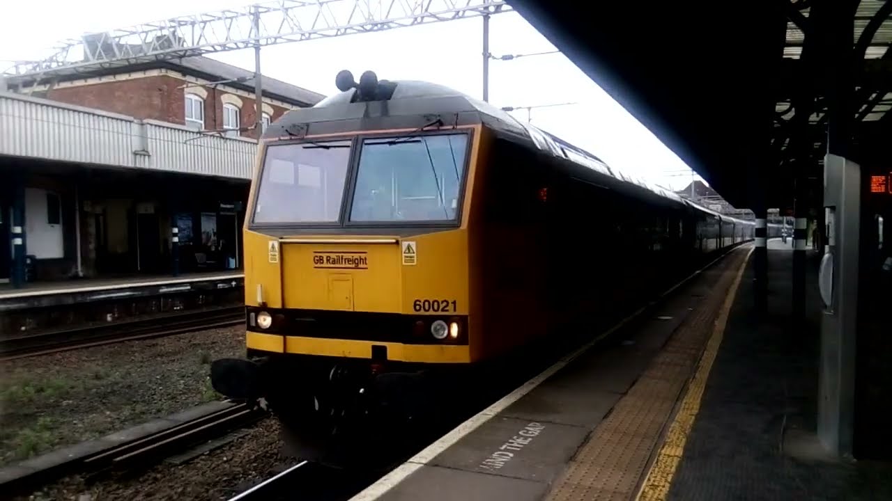 60021 GBRF "PenyGhent" at Stockport hauls Drax Biomass wagons 25-3-24