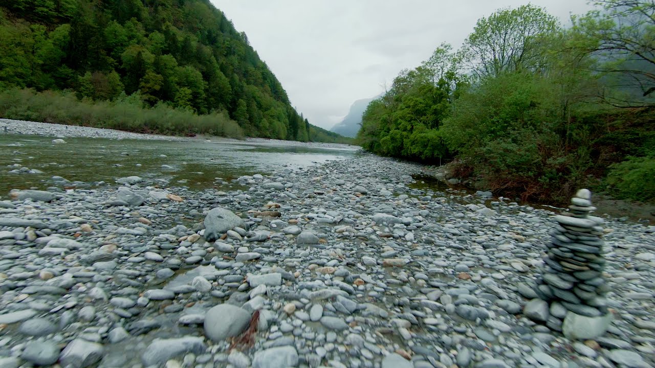 DJI FPV Drohne, flying low over a river, Maggia, Tessin, Schweiz