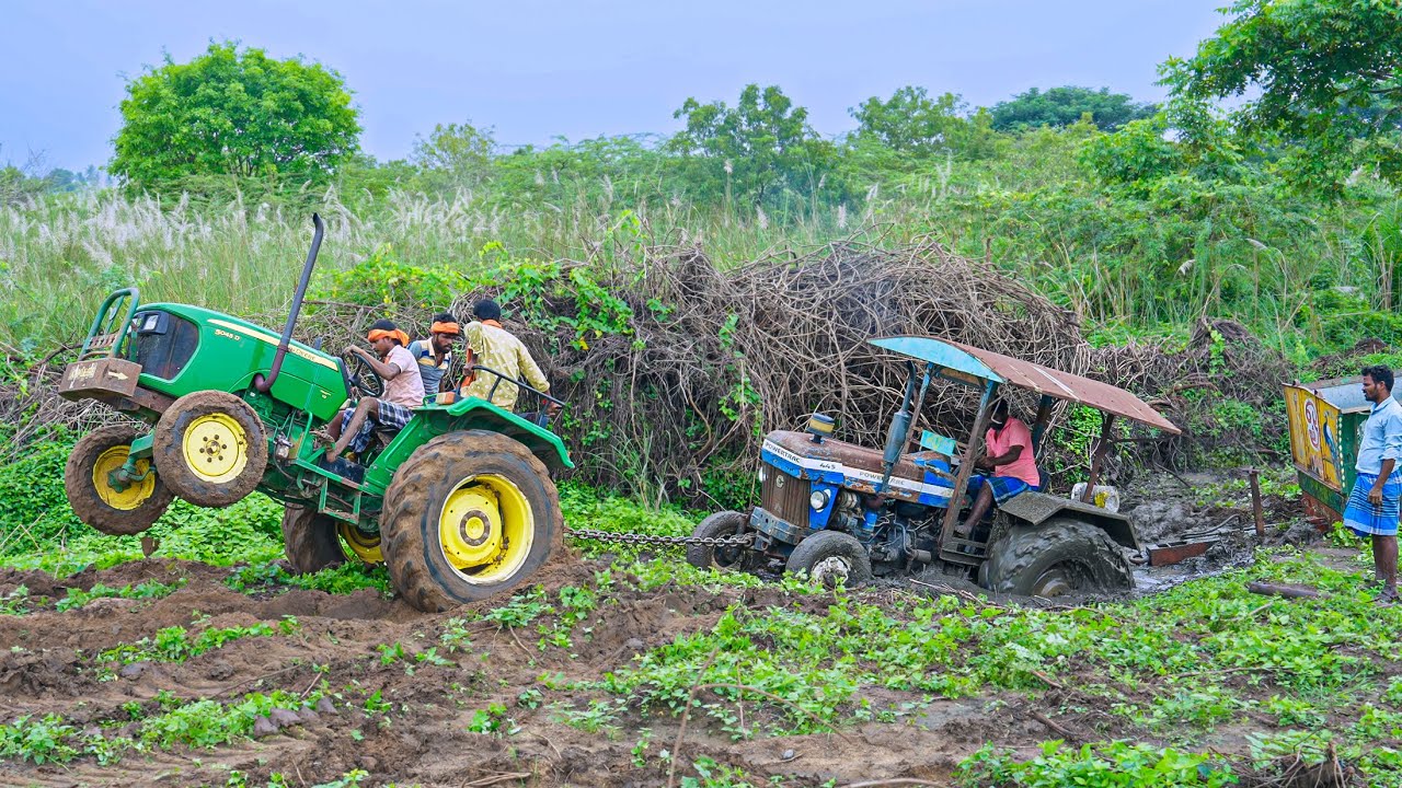 Powertrac 445 Tractor with Trolley Stuck in Deep Mud Bog | John Deere 5045D Pulls It Out