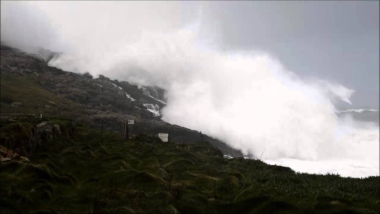 Waves hit Sennen Cove Cornwall during storm Hercules