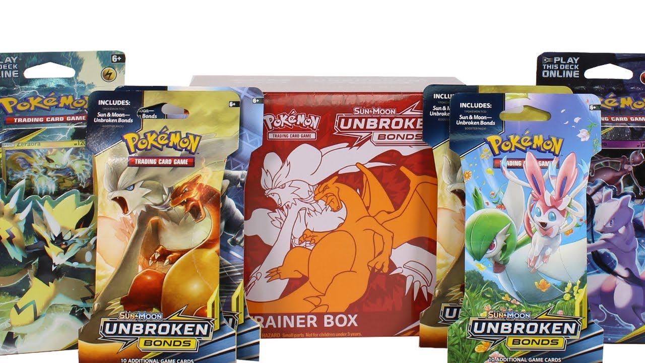 Обзор распаковки элитного тренерского набора Pokemon Sun & Moon Unbroken Bonds, тематических коло...