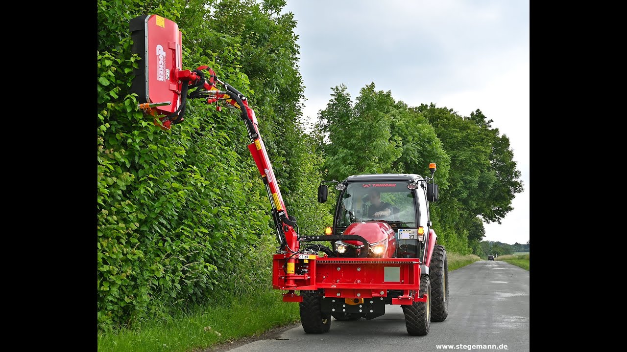 Kommunalschlepper Yanmar YT 359 mit einem Dücker UNA 200 Mäher