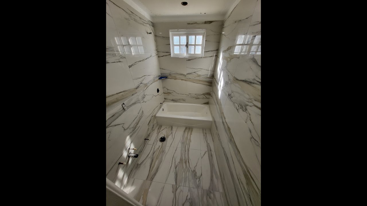 Installing Large Format Tile (24 x 48) Time-lapse