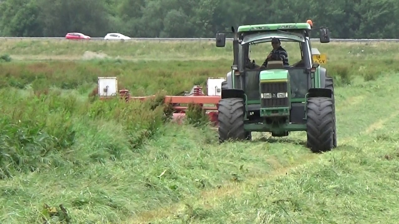 GRAS MAAIEN 1e SNEDE JOHN DEERE 6506 CLAAS