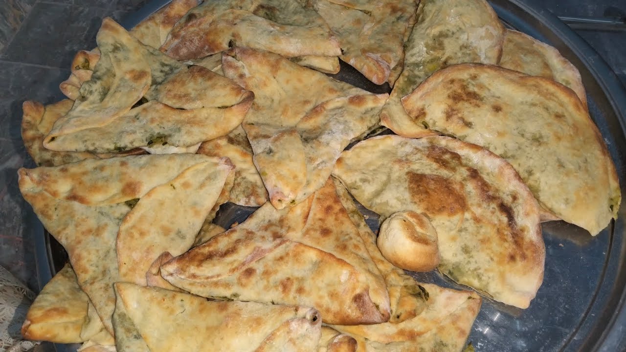 Making bolani, a traditional dish. 😋