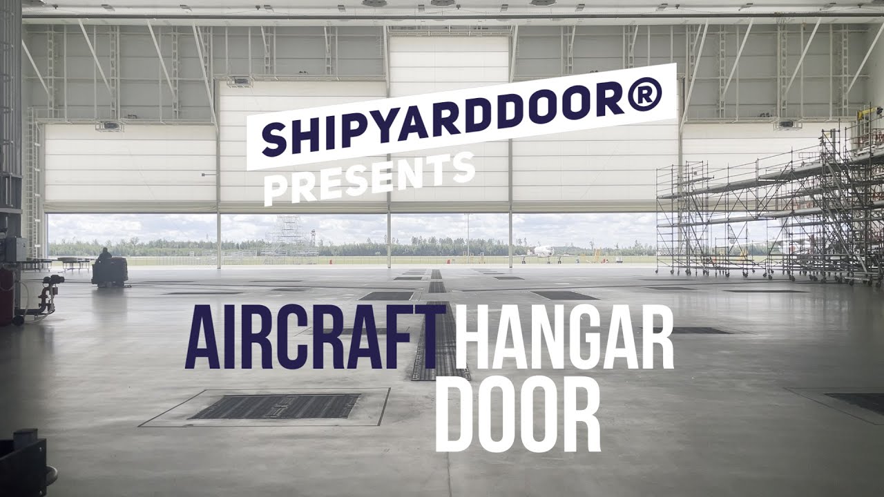 Aircraft Hangar Door with Foldable Mullions | Shipyarddoor's Massive, Wind-Resistant Hangar Solution