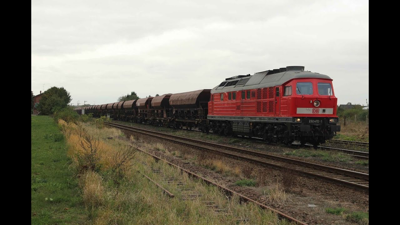 Грузовые поезда в Германии: 232-472 проходит через Барлебен с бутовым каменным поездом. EDE083078