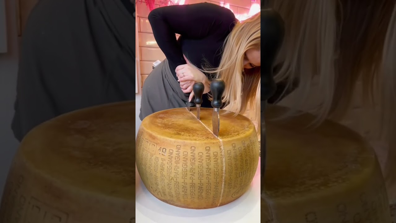 My day as a Cheesemonger - cutting into Parmigiano Reggiano cheese ✨🧀 ￼#cheese #cheeseshop #food
