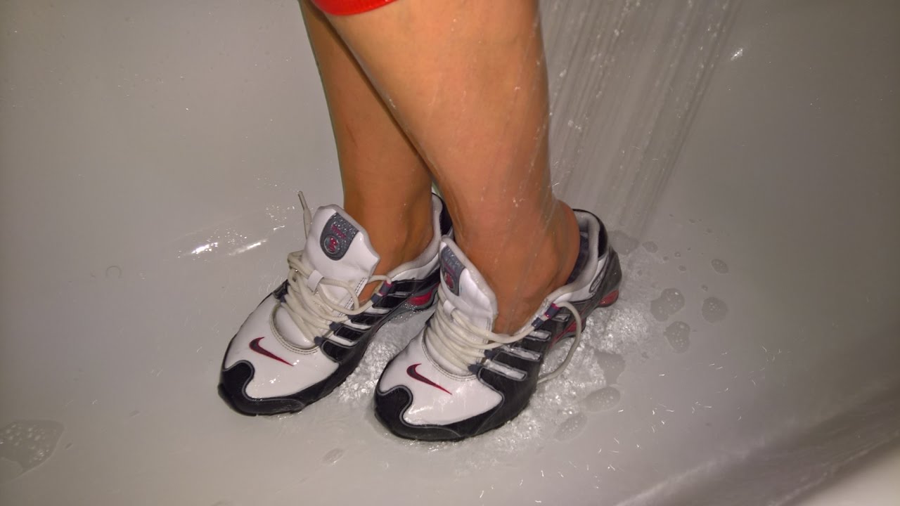 Her sockless Nike Shox wet under shower