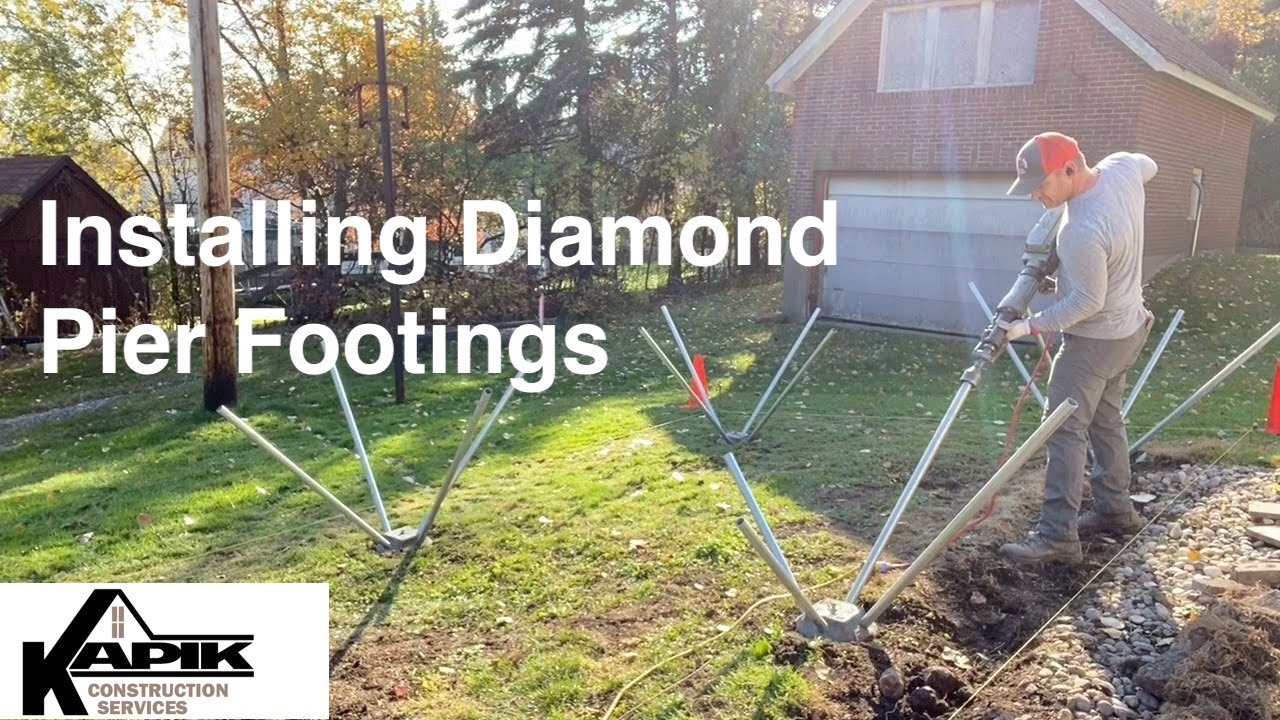 Installing Diamond Pier Footings for this Deck