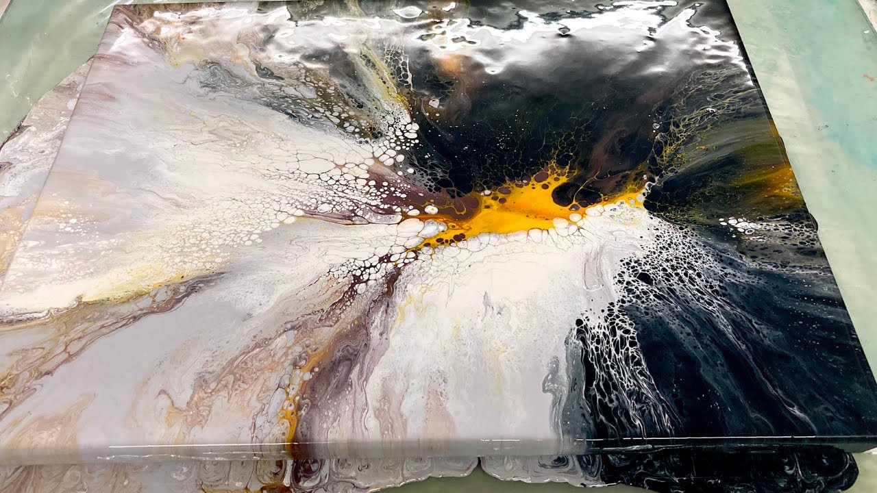 Acrylic pour painting using a hair dryer, featuring mesmerizing pearl cells and intricate lacing.