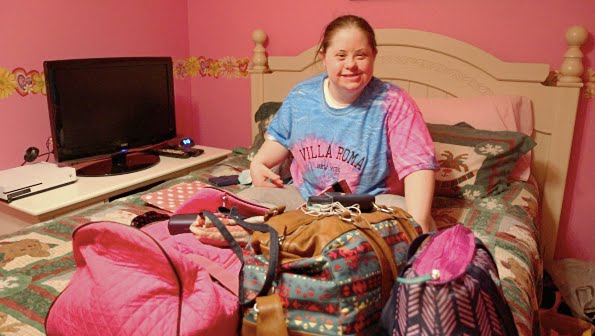 Woman with Down Syndrome faces daily challenges with a smile
