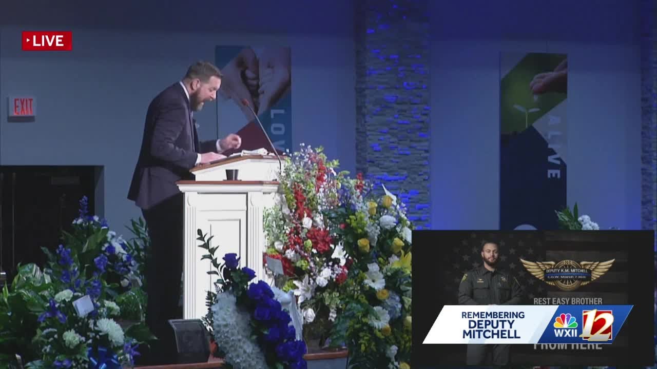 Minister gives message at Deputy Mitchell's funeral