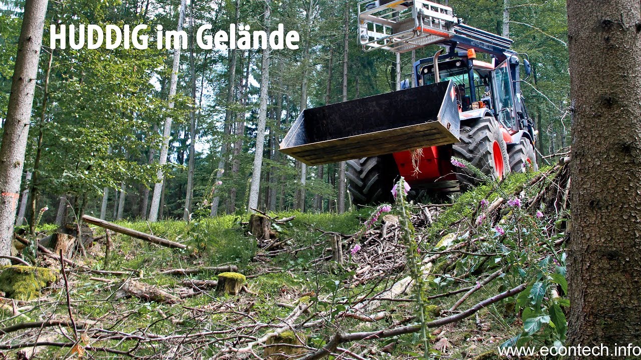 Skidder trail with a backhoe  - HUDDIG Fahrt in Rückegasse mit einem Baggerlader