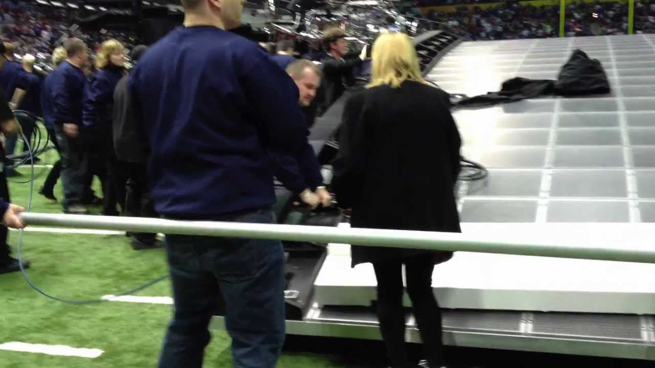 Field view of Madonna's Super Bowl show and the start of the stage tear down.